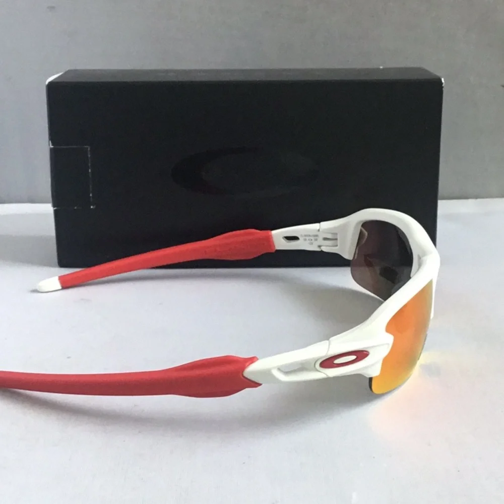 Oakley Youth Sunglasses with White Frame and Orange Lenses